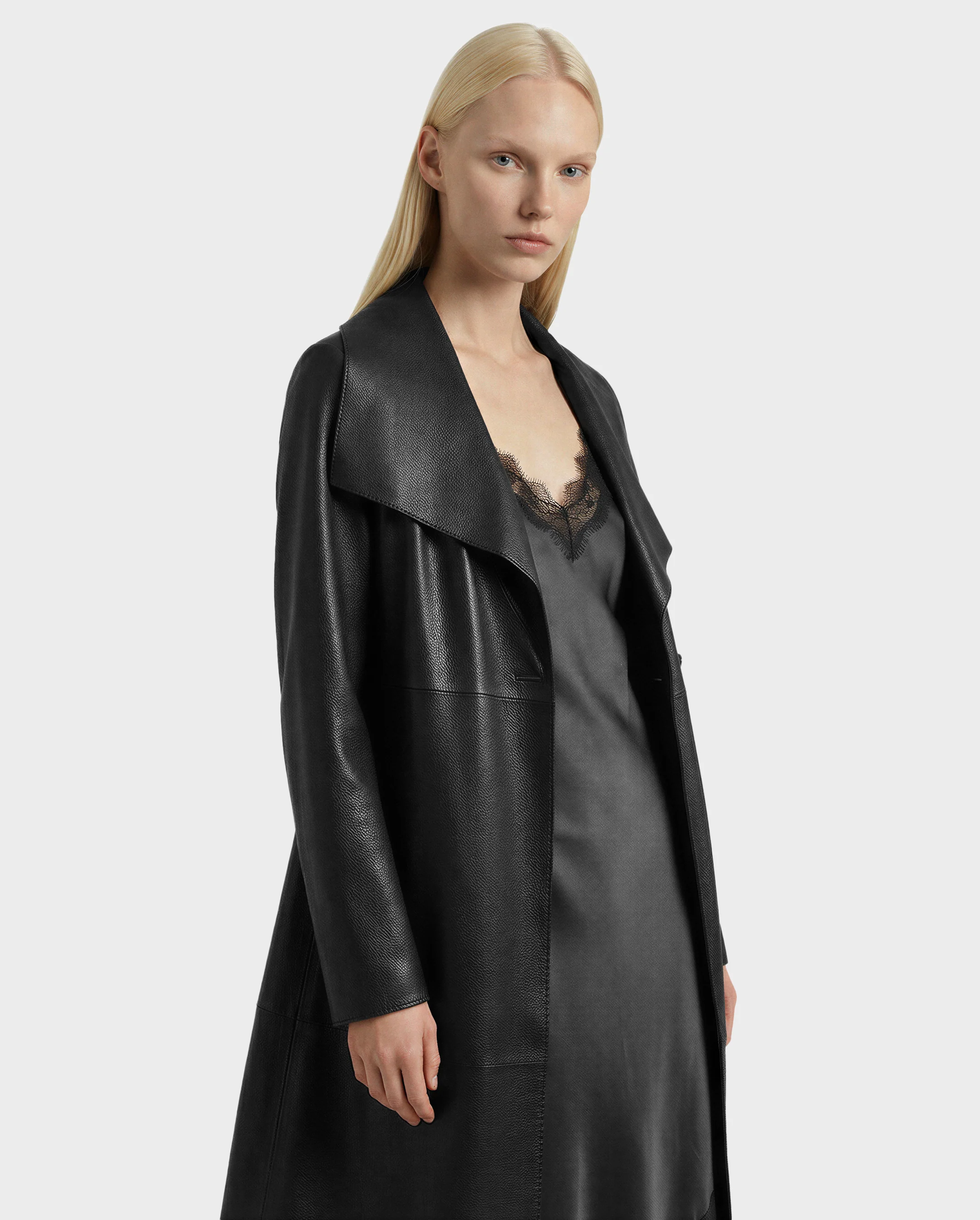 Woman wearing a beige trench coat